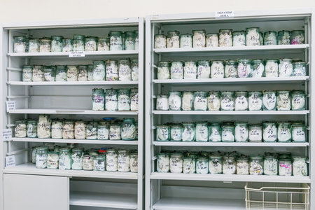 MOSCOW, RUSSIA - June 24, 2009. Glass jars with rags inside - samples of human blood and sweat. Shelves with material evidences in laboratory of examination human olfactory traces. Samples of deadbody's blood.のeditorial素材