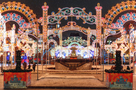 MOSCOW, RUSSIA - January 11, 2017. People walking in historic center of Moscow decorated to New Year and Christmas celebration. Winter snowy evening.のeditorial素材