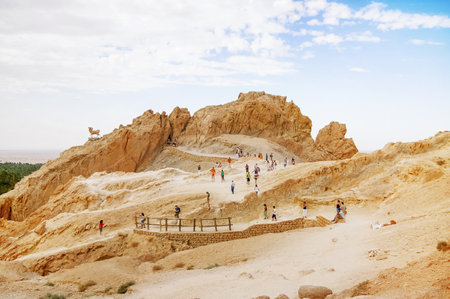 CHEBIKA, TUNISIA - September 04, 2007. Tourists in oasis Chebika, famous landmark in Sahara desert.のeditorial素材