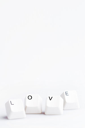 Word LOVE on computer keyboard's  buttons. May be used as symbol of love on the Internet, love e-mail letters.の写真素材