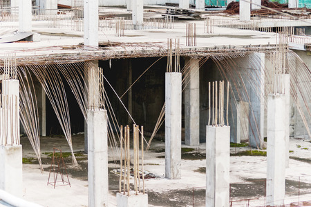 Construction site. Ferroconcrete columns with reinforcement. The process of creating building. Russia, Moscow.の写真素材