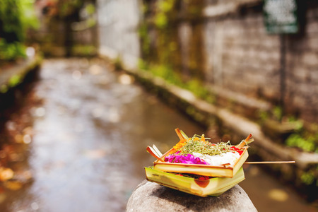 Traditional offerings to the gods. Common religious tradition in the Buddhist and hinduistic countries in Asia. Bali, Indonesia.の写真素材