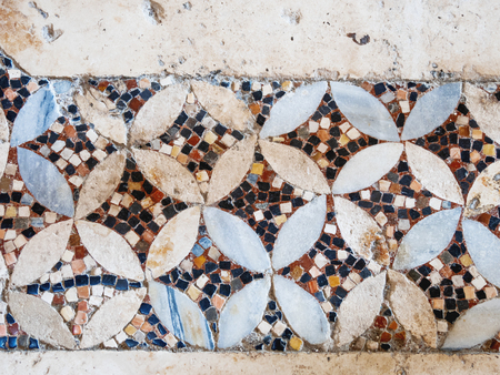 Ancient stone floor of the Church of St. Nicholas. Ancient authentic mosaic on the floor in famous religious landmark in Demre, Turkey.の写真素材