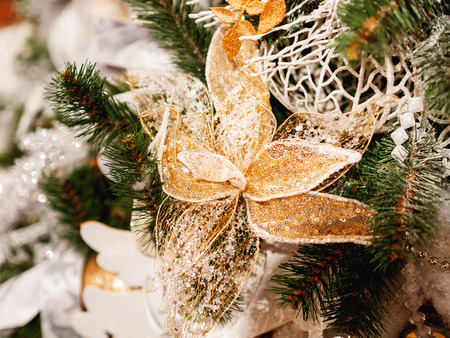 Elegant flower, made of fabric with sequins. New Year decoration for Christmas tree.の写真素材