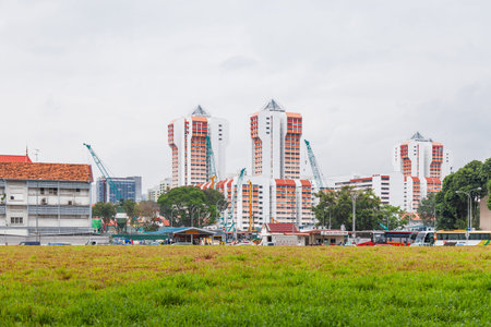 SINGAPORE, SINGAPORE - January 16, 2013. Cityscape with construction of colorful residential...
