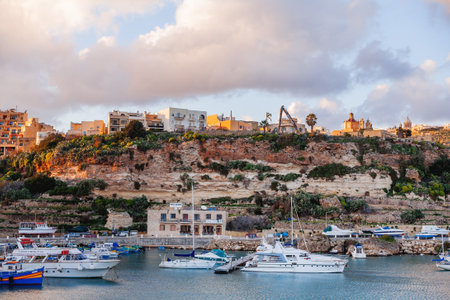 GOZO, MALTA - February 20, 2010. Port of Mgarr on the small island of Gozo, Malta. Sunset, panorama view.のeditorial素材