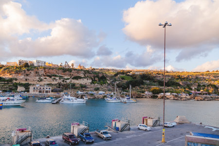 GOZO, MALTA - February 20, 2010. Port of Mgarr on the small island of Gozo, Malta. Sunset, panorama view.のeditorial素材