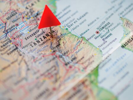 World map of United Kingdom of Tanzania with capital city Dodoma. Red triangle pin points on it.の写真素材