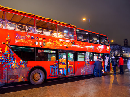 MOSCOW, RUSSIA - January 03, 2018. People come into red double-deck touristic busのeditorial素材