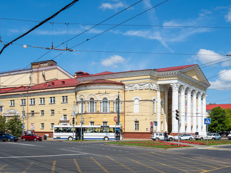 KALININGRAD, RUSSIA - July 15, 2019. Cars are moving pass Kaliningrad Regional Drama Theatre.のeditorial素材
