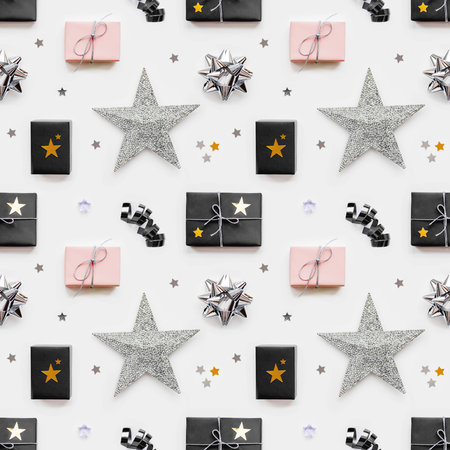 Photo seamless pattern with holiday presents. Gifts wrapped in pale pink and black paper with silver...