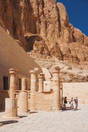DEIR EL-BAHARI, Egypt - September 16, 2008. Group of tourists walking in famous mortuary temple of Hatshepsut. UNESCO World Heritage Site.のeditorial素材