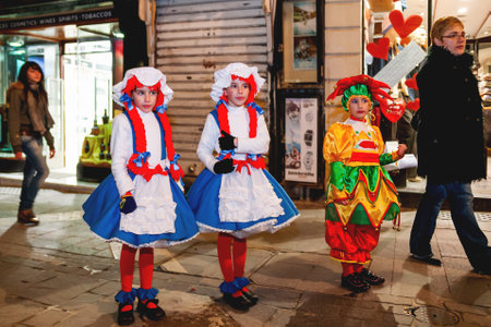 VALLETTA, MALTA - February 12, 2010. Traditional night festival. Carnival with giant moving dolls and people in colorful costumes.のeditorial素材