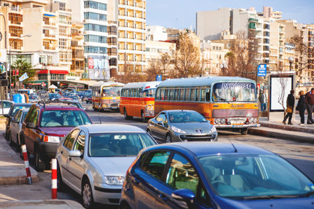 SLIEMA, MALTA - February 13, 2010. Colorful old British buses from the 60s were used as public...
