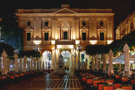 VALLETTA, MALTA - February 13, 2010. Night view on building of National Library of Malta.のeditorial素材
