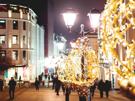 MOSCOW, RUSSIA - December 12, 2019. Streets of historic downtown decorated for New Year and Christmas celebration. Street lanterns with decorative balls and light bulbs.のeditorial素材