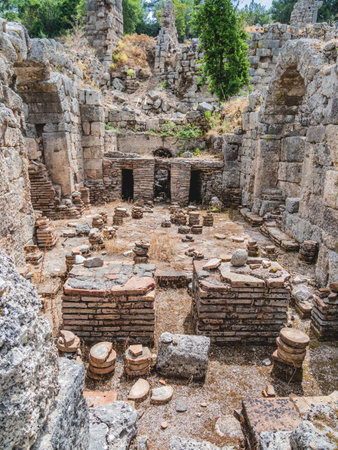 Ruins of large bath in ancient Phaselis city. Famous architectural landmark, Kemer district, Antalya province. Turkey.のeditorial素材