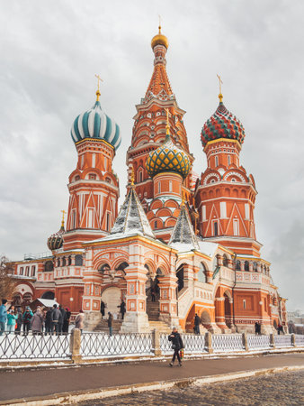 MOSCOW, RUSSIA - December 15, 2018. Tourists near St. Basil's Cathedral on Red square. Traditional Christmas fair. Moscow, Russia.のeditorial素材