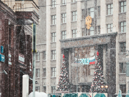 MOSCOW, RUSSIA - December 28, 2018. State Duma of Russia (inscribed - State Parliament). Facade of building decorated for New Year 2019 celebration.のeditorial素材