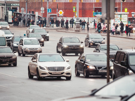MOSCOW, RUSSIA - December 28, 2018. Traffic in historical center of Moscow. People on street in winter snowy day.のeditorial素材