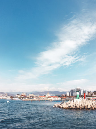 SOCHI, RUSSIA - March 24, 2020. View on port, embankment and lighthouse from Black sea in sunny weather.のeditorial素材