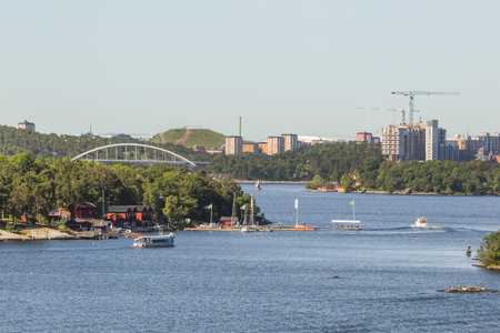 View from ship to suburbs of Stockholm. Ferry trip across the Baltic Sea. Tourism to Europe and...
