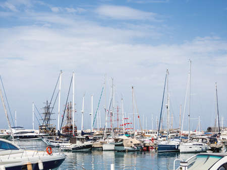 Yachts are moored at the Grand Marina, Kemer, Turkey. Beautiful ships for tourist trips on the Mediterranean sea.の写真素材