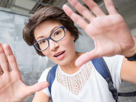 Excited woman with short hair in eyeglasses. summer vibes. sincere emotions.の写真素材
