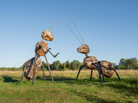 KARGOPOL, RUSSIA - September 10, 2018. Wooden statues of ants in park named Path of anthills.のeditorial素材