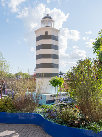 MOSCOW, RUSSIA - May 29, 2022. Decorative lighthouse of Alevina cape on festival Fish Week. Food fair on Manezhnaya square.のeditorial素材