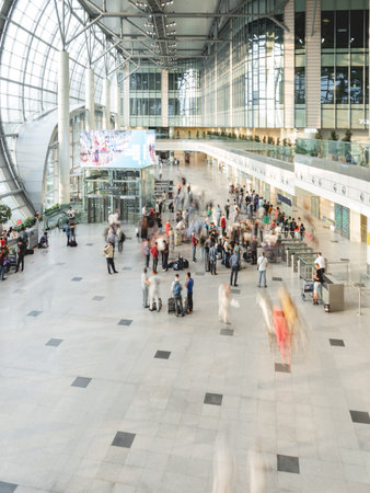 MOSCOW, RUSSIA - June 28, 2021. Top view on moving people on first floor at Domodedovo airport hall. Long exposure.のeditorial素材