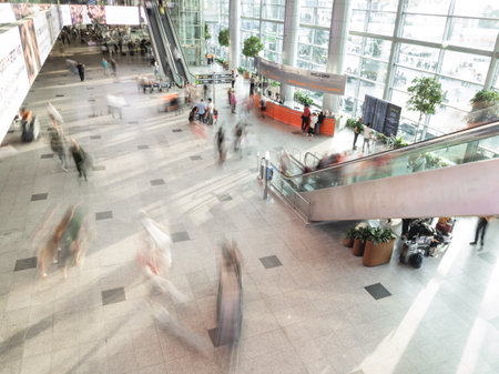MOSCOW, RUSSIA - June 28, 2021. Top view on moving people on first floor at Domodedovo airport hall. Long exposure.のeditorial素材