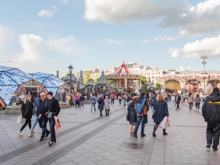 MOSCOW, RUSSIA - May 29, 2022. People walk among street shops on Fish Week festival. Food fair with stores and outdoor decorations.のeditorial素材