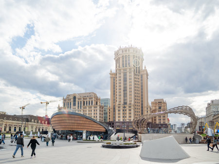 MOSCOW, RUSSIA - May 01, 2022. Local people and tourists walk on square near Paveletsky railway. Modern urban architecture.のeditorial素材