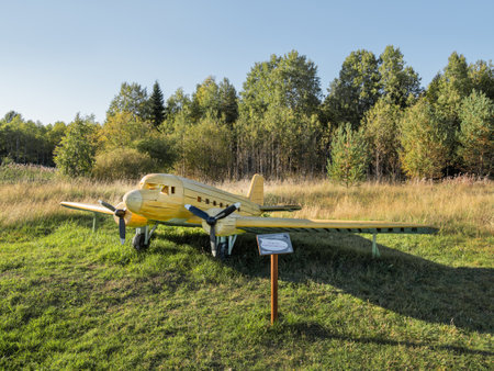 KARGOPOL, RUSSIA - September 10, 2018. Wooden statue of retro airplane in park named Path of anthills.のeditorial素材