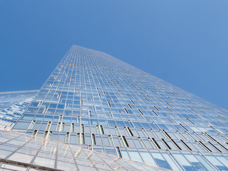 MOSCOW, RUSSIA - October 16, 2022. Bottom view on glass walls of OKO Tower of Moscow International Business Center on clear blue sky background. Downtown district in sunny day.のeditorial素材