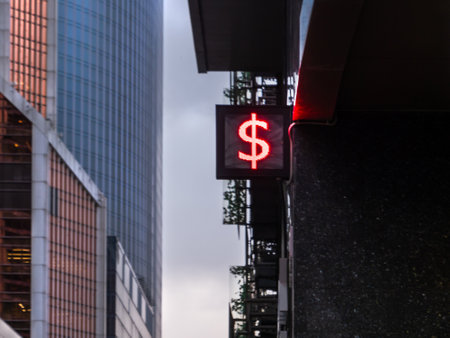 Symbol of USD, Dollar, currency of USA on outdoor electric screen. Currency exchange office or bank branch in downtown.の写真素材