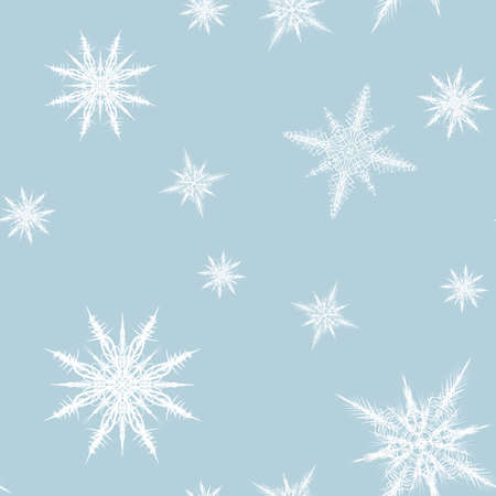 seamless pattern white snoflakes on the flat blue backgroundの写真素材