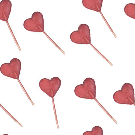 Seamless pattern. Valentines Day. Delicate Love. Hand drawn water color heart shape lollipops on the flat white backgroundの写真素材