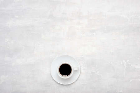 Creative layout made of tasty coffee cup on gray background with copy space. top view .の写真素材