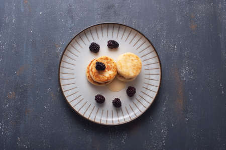 Healthy  pancakes prepared with cottage cheese served with raspberry and honey.Healthy eating concept. Flat lay.の写真素材