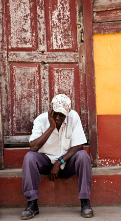A man sitting on the Street from Trinidad, Cuba