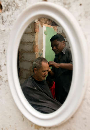 A street barbershop in Trinidad, Cubaのeditorial素材