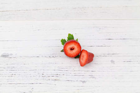 Close up Fresh healthy fruits Strawberry with leaves over wooden texture background. Copy Space concept. Healthy Foodの写真素材