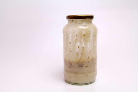 Carbonara Sauce in the bottles open jar. Selective focusの写真素材