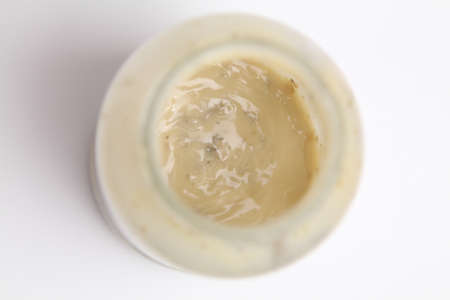 Carbonara Sauce in the bottles open jar. Selective focusの写真素材