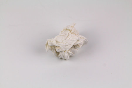 Used screwed paper tissue isolated on white backgroundの写真素材