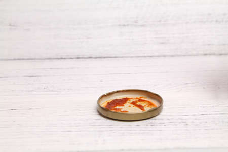 Open Glass jar with delicious homemade classic spicy tomato pasta or pizza sauce over wooden texture backgroundOpen Glass jar with delicious homemade classic spicy tomato pasta or pizza sauce over wooden texture backgroundの写真素材