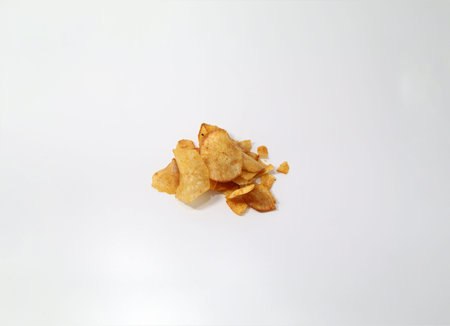A tapioca chips snack coated with honey flavor isolated white backgroundの写真素材