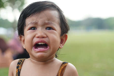 Cute Litle Girl Cry with Sad Face expression.の写真素材